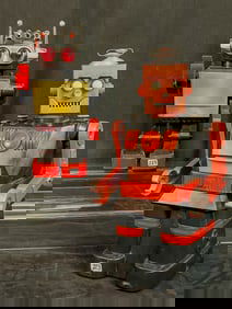 Vintage 1950s Marx Electric Morse Code Robot and 1980s Saturn Robot