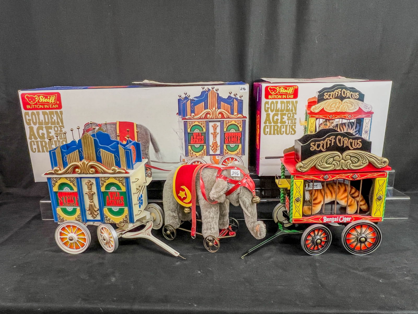 Steiff Golden Age of Circus Elephant, Begal Tiger, New in Box Limited Edition: 2 SteiffLimited Edition c.1986 Golden Age of Circus toys, new in box to include #0100/86 Elephant pulling a circus wagon along with a certificate of authenticity numbered 2676/5000, and a Begal Tiger