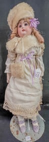 Antique Kestner Bisque head and Shoulders with antique clothing