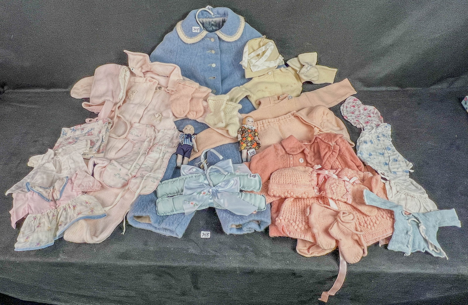 Group of 1930's/40's Doll and Baby Clothing, More!: A group of 1930's and 40's baby and Doll clothing to include a snow suit, sweaters, floral bonnets, satin hangers and two 5.5" tall bisque body dolls c1970's