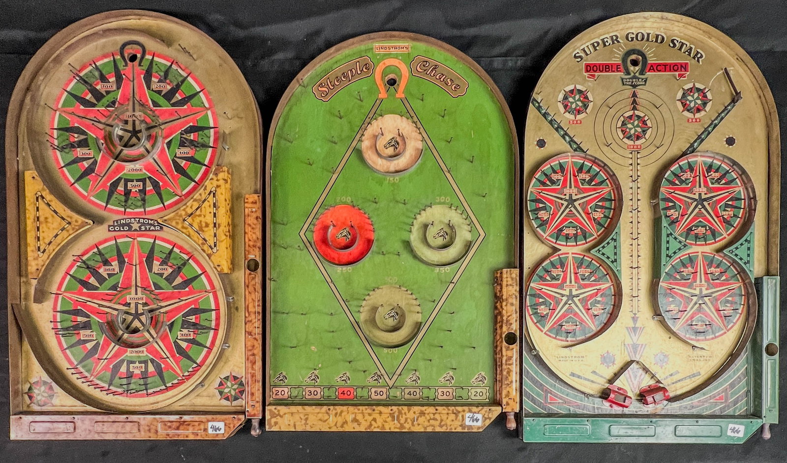 3 Anitique Lindstrom Tabletop Pinball Games C1934: 3m Lindstrom tabletop pinball games to include: "Lindstrom's Gold Star" c 1934in very good condition, a "Lindstoms Steeple Chase" Bagatelle pinball game c.1934 in good condition, and a Lindstroms "Sup