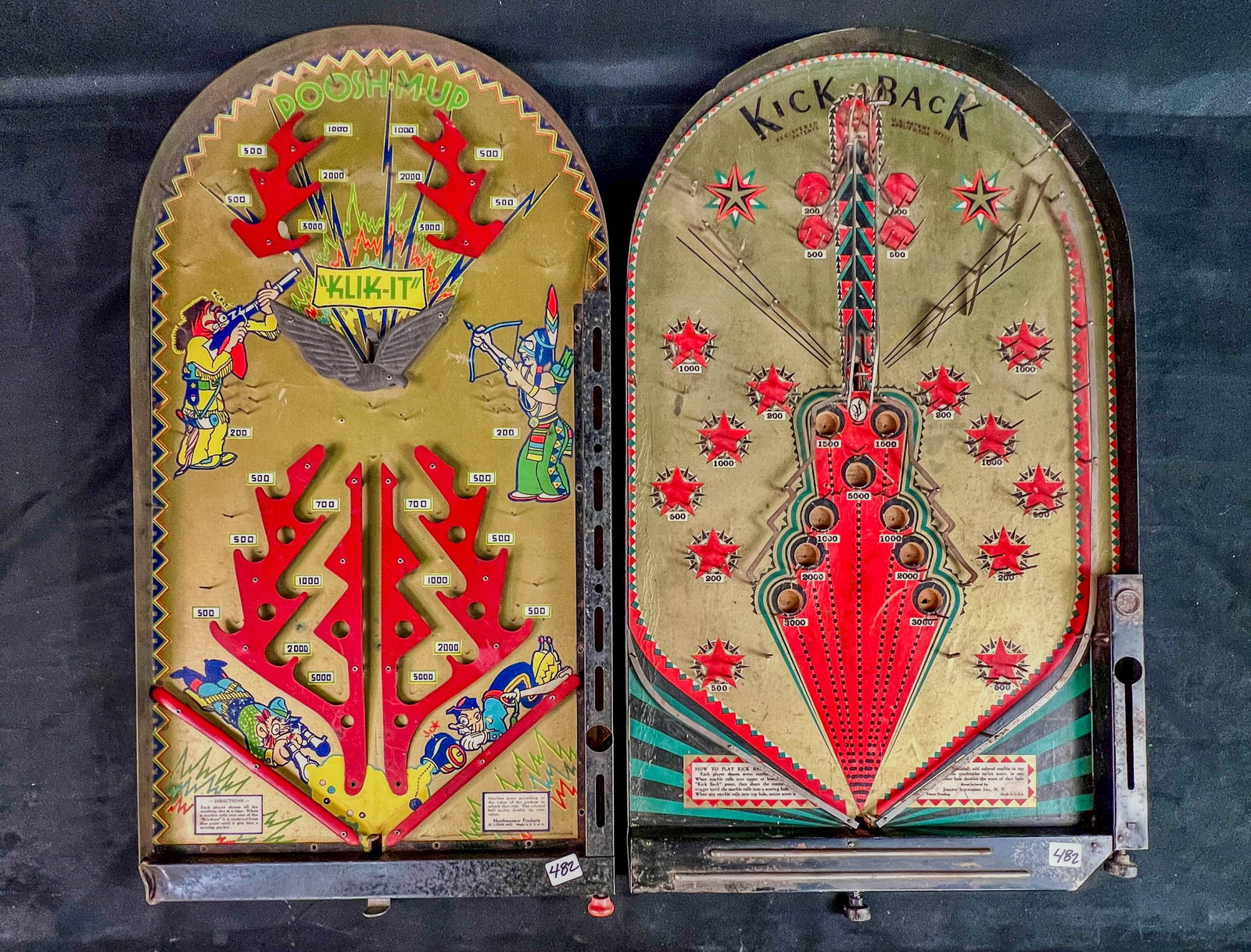 2 1930's Table Top Pinball Bagatelle Games: Lot to include: a Josph Schneider Inc. "Kick-Back' pinball game c 1935 with Art Deco detailing, and a Northwestern Products Poosh-M-Up "Klik-It" #1635 western themed pinball game c1938 in good conditi