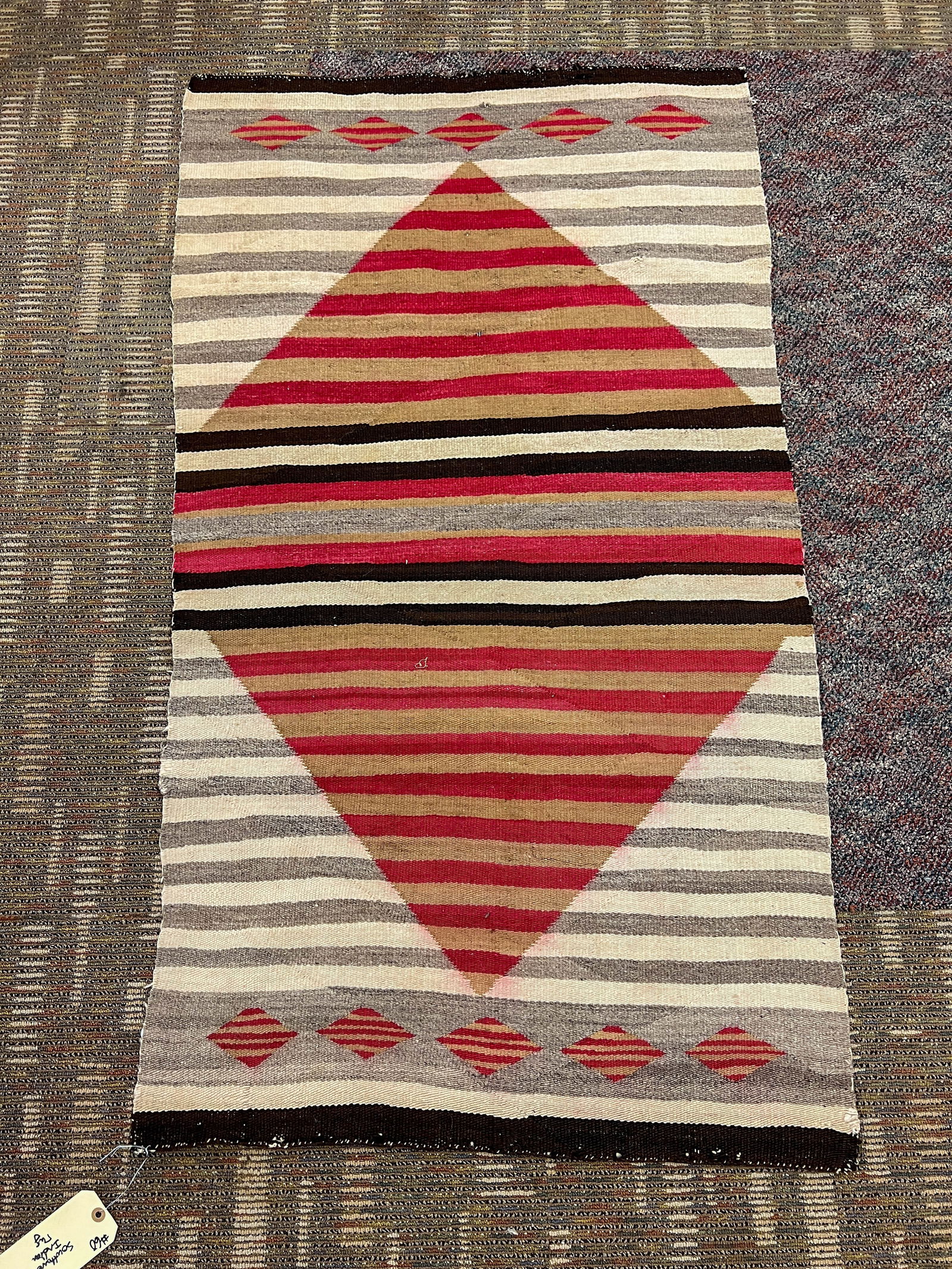 Rare Antique Southwest Indian Blanket/Rug: A rare southwest Indian antique blanket/rug (saddle blanket?). This unusual rug is in a diamond pattern in brown, cream, umber, and gold. Probably woven between 1900-1915. It is in excellent condition