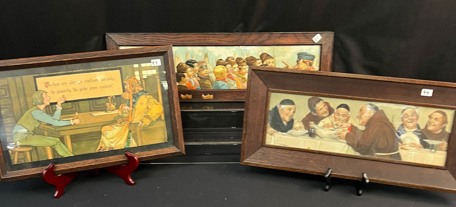 Mission Arts and Crafts Fumed Oak Frames With Prints: Three mission arts and crafts fumed oak frames with prints to include: a peasant and king talking with verse Riches are always restless: 'tis only to poverty the gods give content measures 18.75" tall