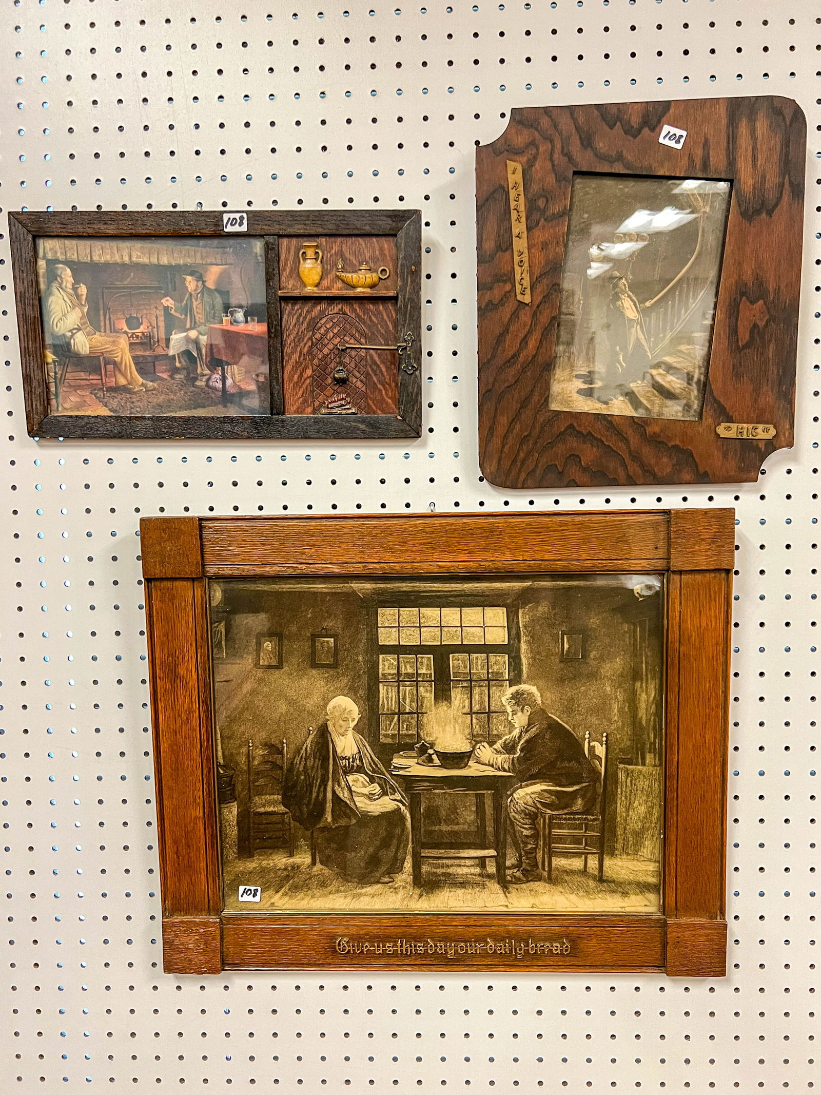 Three Mission Arts and Crafts Fumed Oak Framed Prints: Three Mission Arts and Crafts Fumed Oak Framed Prints to include: Oak molded decoration depicting a fire place showing a family around the fire place. It measures 8.5" tall x 15.75" wide; secondly, a
