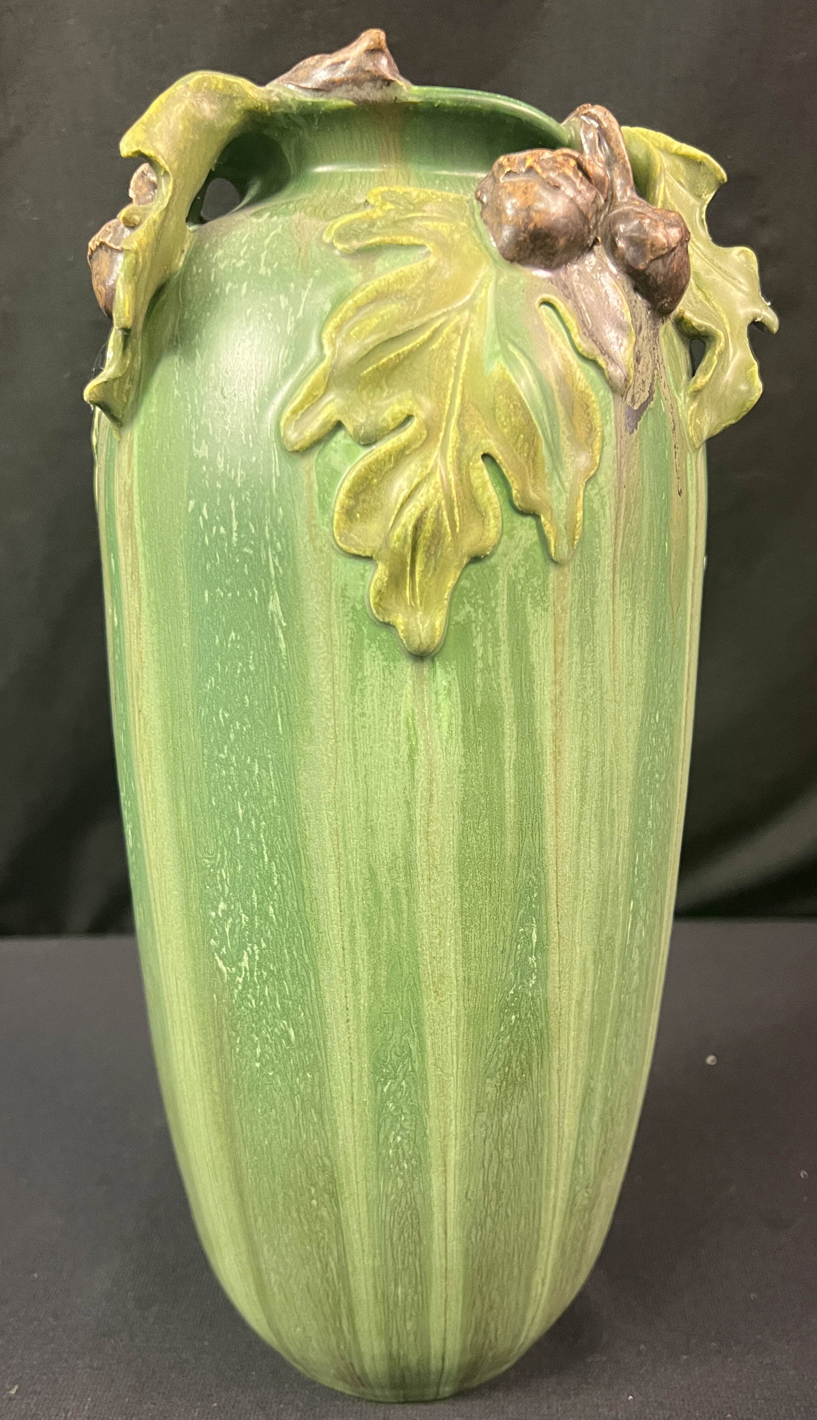 Mission Arts and Crafts Style Ephraim Pottery Stalwart Oak Vase: Mission Arts and Crafts Style Ephraim Pottery Stalwart Oak Vase. 154 made retired 12/15/13. This wonderful vase has oak leaf's handles and oak leaf and acorn decorations. It is a striped green design.