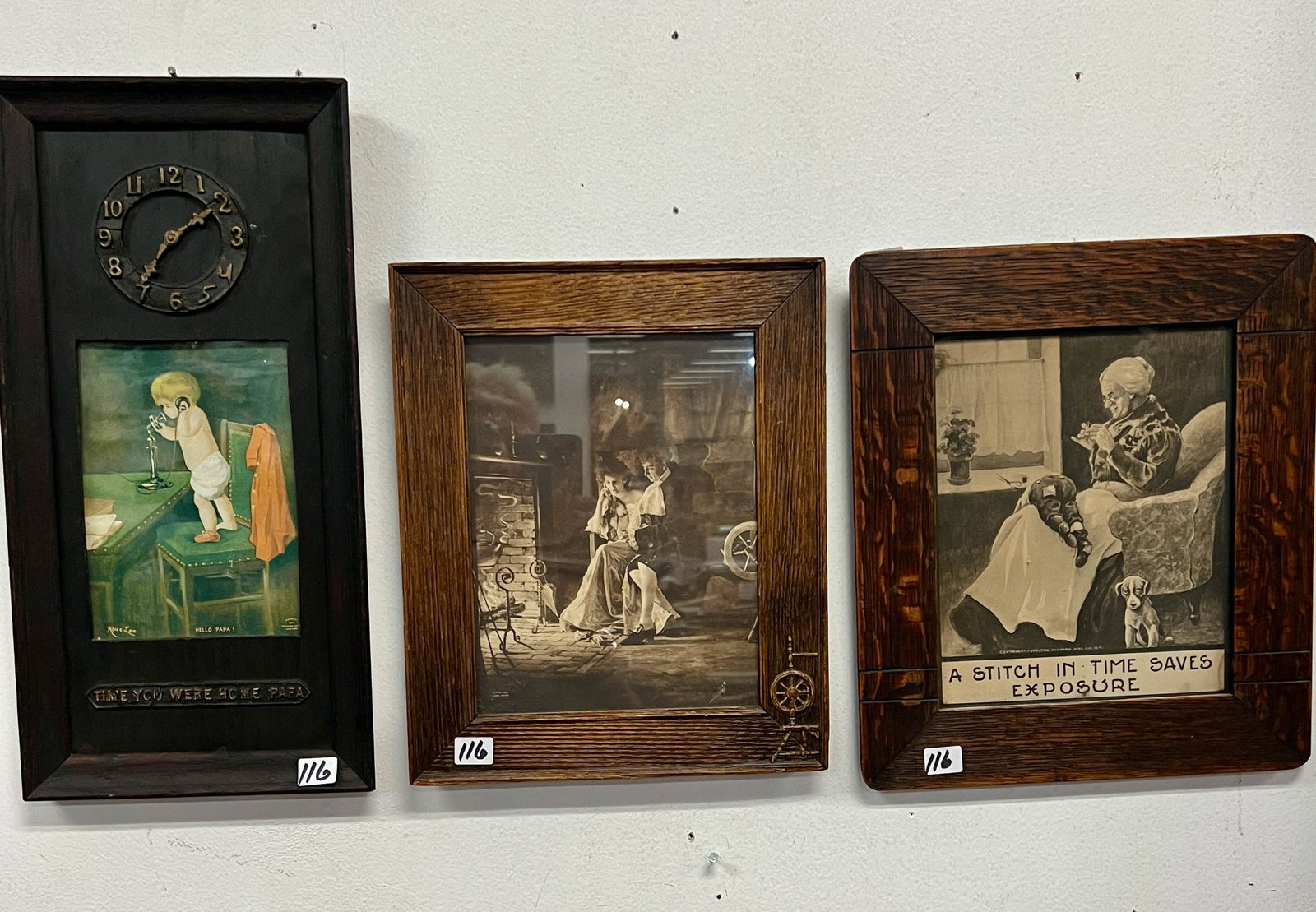 Three Mission Arts and Crafts Fumed Oak Framed Prints: Three Mission Arts and Crafts Fumed Oak Framed Prints to include: a frame with a molded clock with verse that reads Time you were home papa depicting a baby using a candle stick telephone it measures 