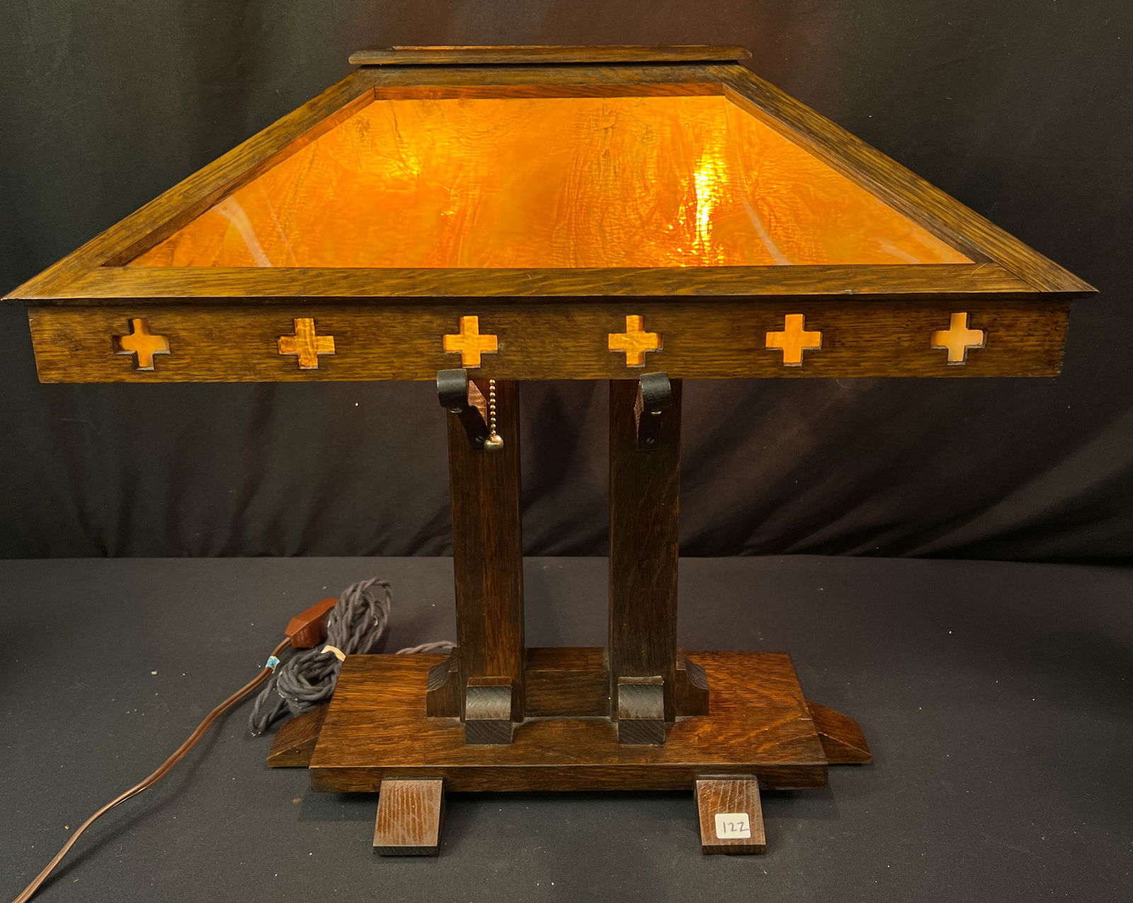 Mission Arts and Crafts Desk Lamp: Mission Arts and Crafts Double pedestal desk lamp with caramel slag glass inserts. With original finish (attributed to Stickley) this all original desk lamp is in excellent condition, house ready, and