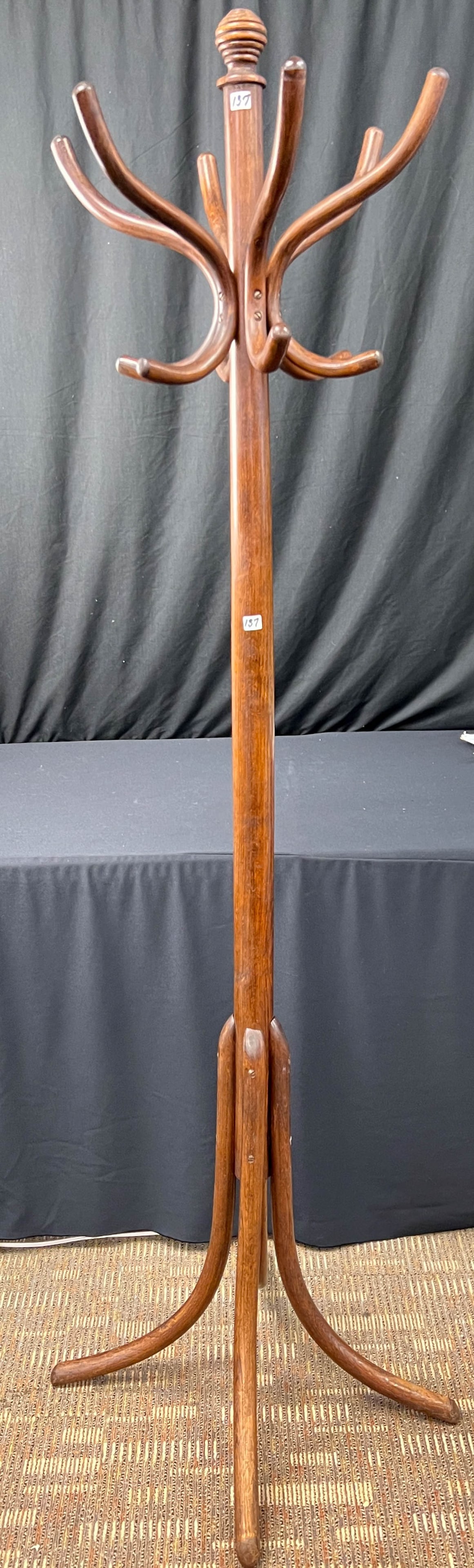 Antique Thonet Hall Tree: Antique floor standing Thonet hall tree mahogany with five hooks on splayed base. It is in great condition and it measures 74" tall.