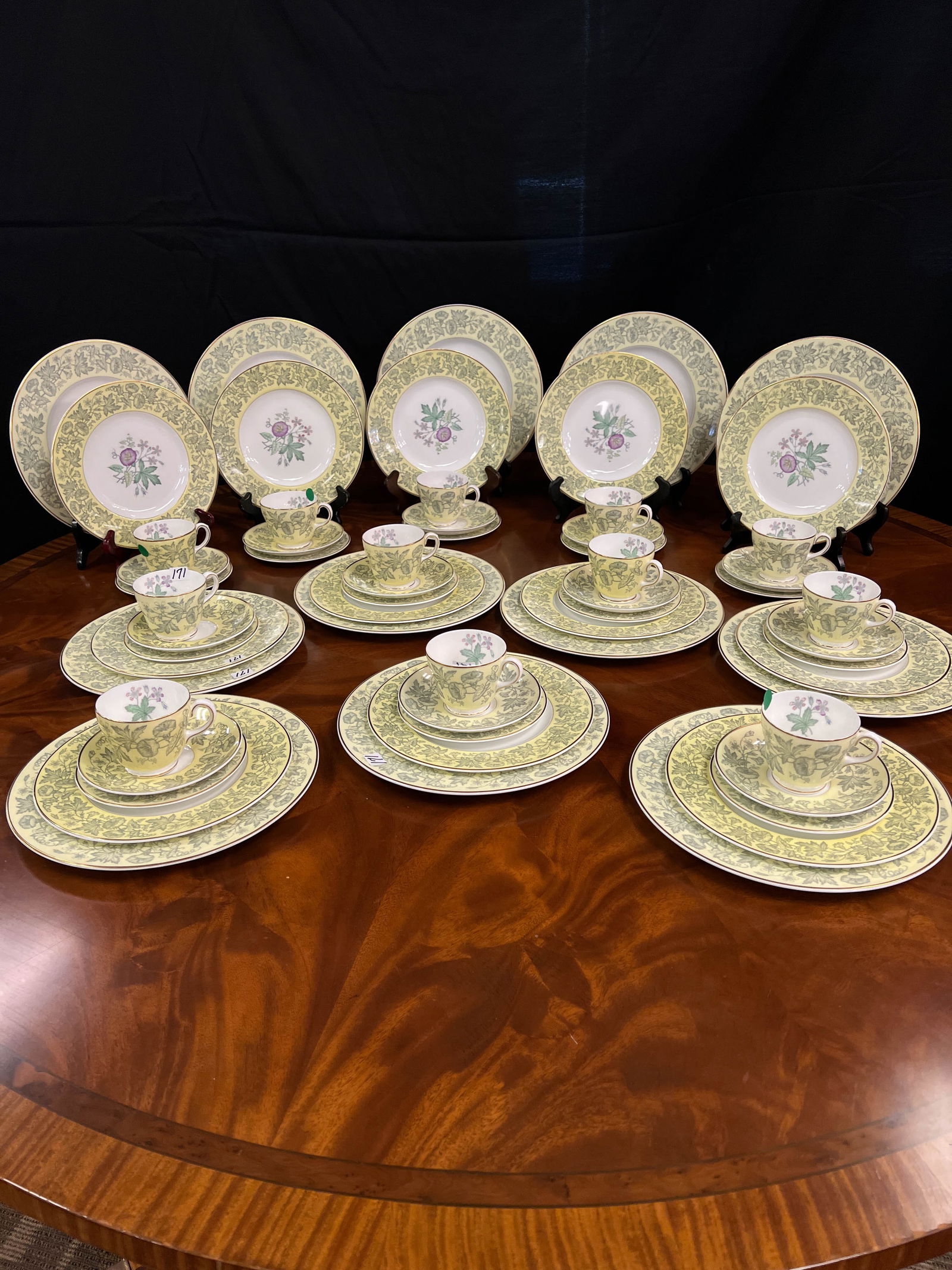 Wedgwood China in Wildflower Pattern: Wedgewood bone china made in England W-D-3998 Wildflower pattern. Consisting of 12 cups and saucers. 12 fruit plates, 12 luncheon plates, 12 dinner plates.