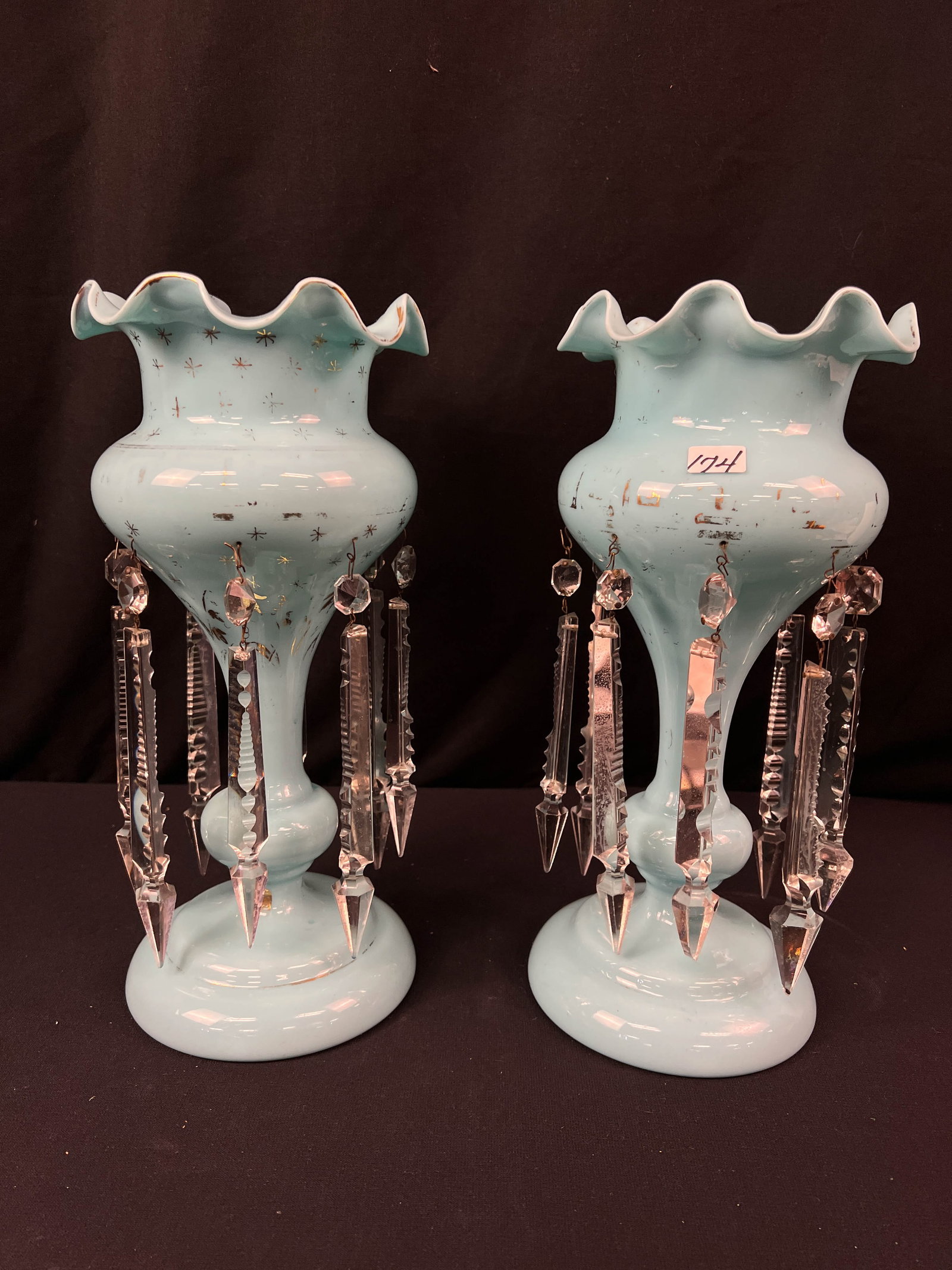 A Pair of French Blue Girandoles: A pair of French blue hand blown girandoles in French blue with elaborate zipper and serpentine cut crystals. In excellent condition they measure 13.5" x 6.5"