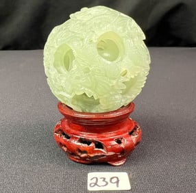 A Chinese Jade Hand Carved Four Tiered Mystery Ball On Stand