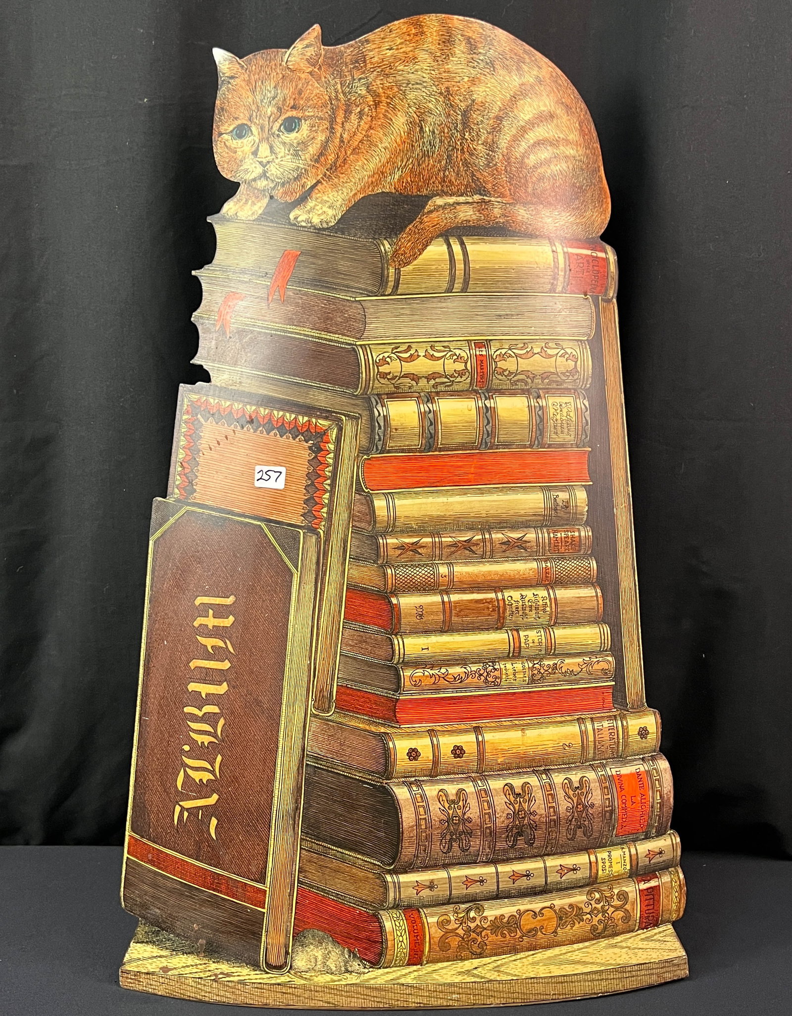 Piero Fornasetti MCM Cat & Books Metal Umbrella Stand c1955: A Piero Fornasetti Cat & Books metal umbrella stand c.1955 in excellent condition. Stand retains original sticker reading Fornasetti - Milano Made in Italy. Piece measures 28" tall X 15.5" across X 7.