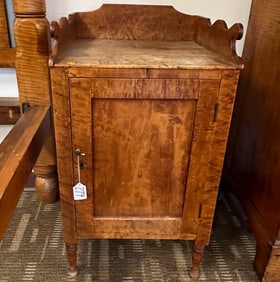 An 1800-1820 Tiger Maple Single Door Wash Stand