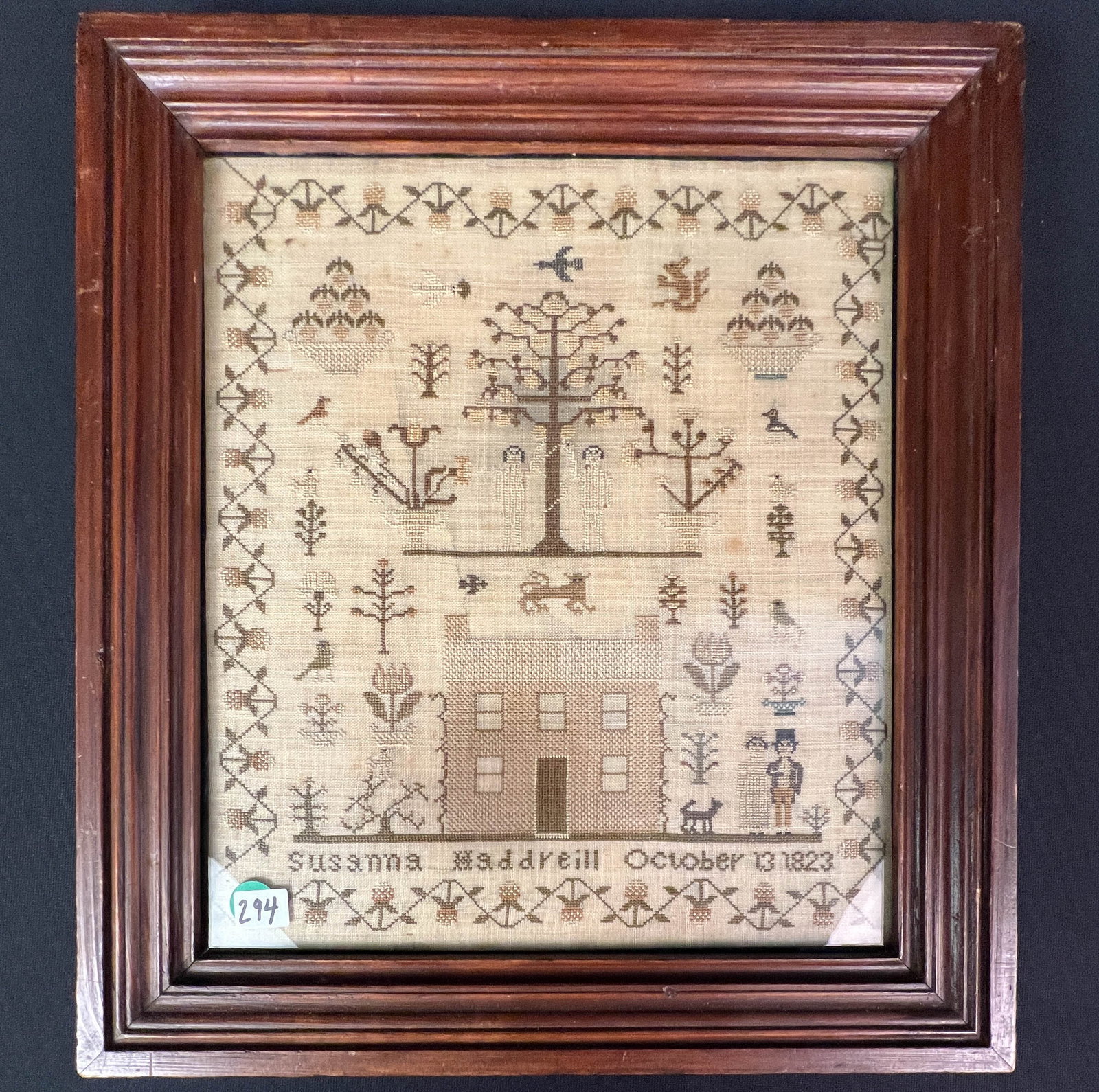 A Folk Art Antique New England Sampler C.1832: An extraordinary New England antique sampler dated Oct. 13, 1823. Signed Susanna Maddreill and it includes Adam & Eve, tree of life, a house, birds, plants, a married couple, a black cat, and a floral