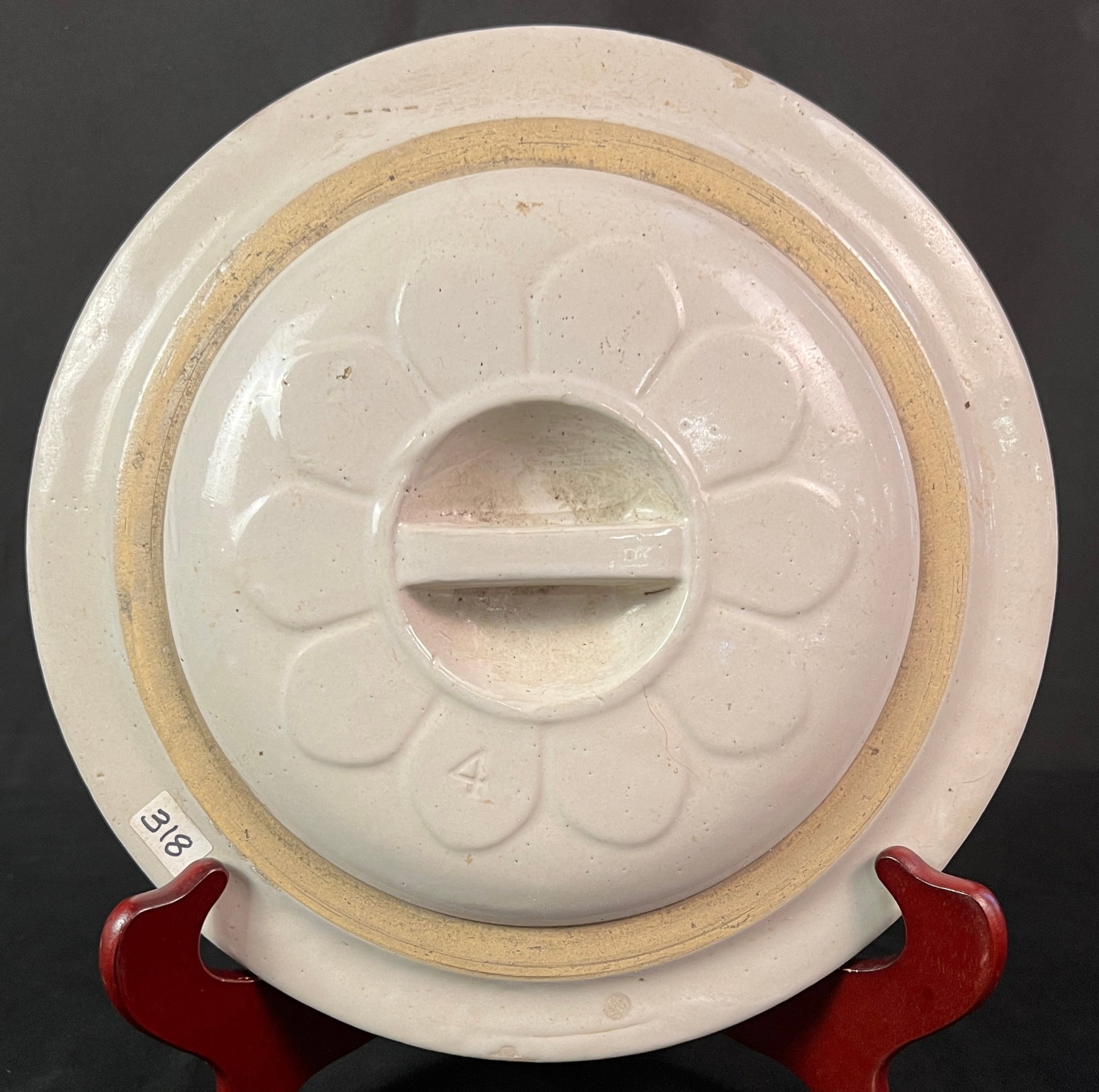 Rare Red Wing Four Gallon Crock Cover: A rare four gallon crock cover with in sized sunflower decoration and handle. It is in excellent mint condition, It measures 12" round