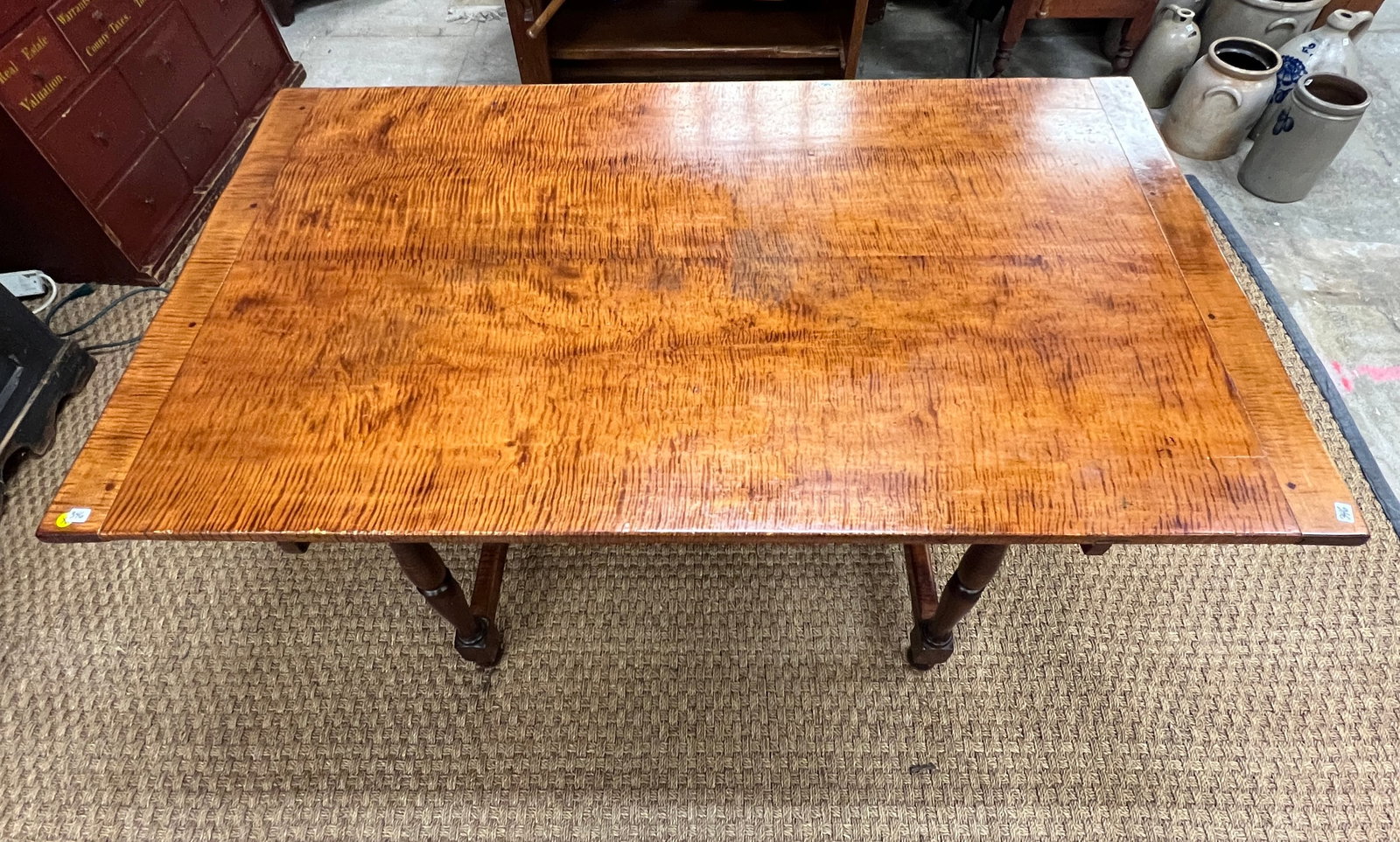 Profusely Tiger Striped and Burled Hand Made Pegged Table: This handmade profusely tiger striped and burled Colonial replica kitchen or work table features a bread board edged tiger maple top, pegged construction, and tiger striped turned legs and stretchers.