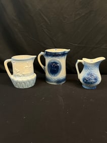 Three Early Blue and White Stoneware Pitchers