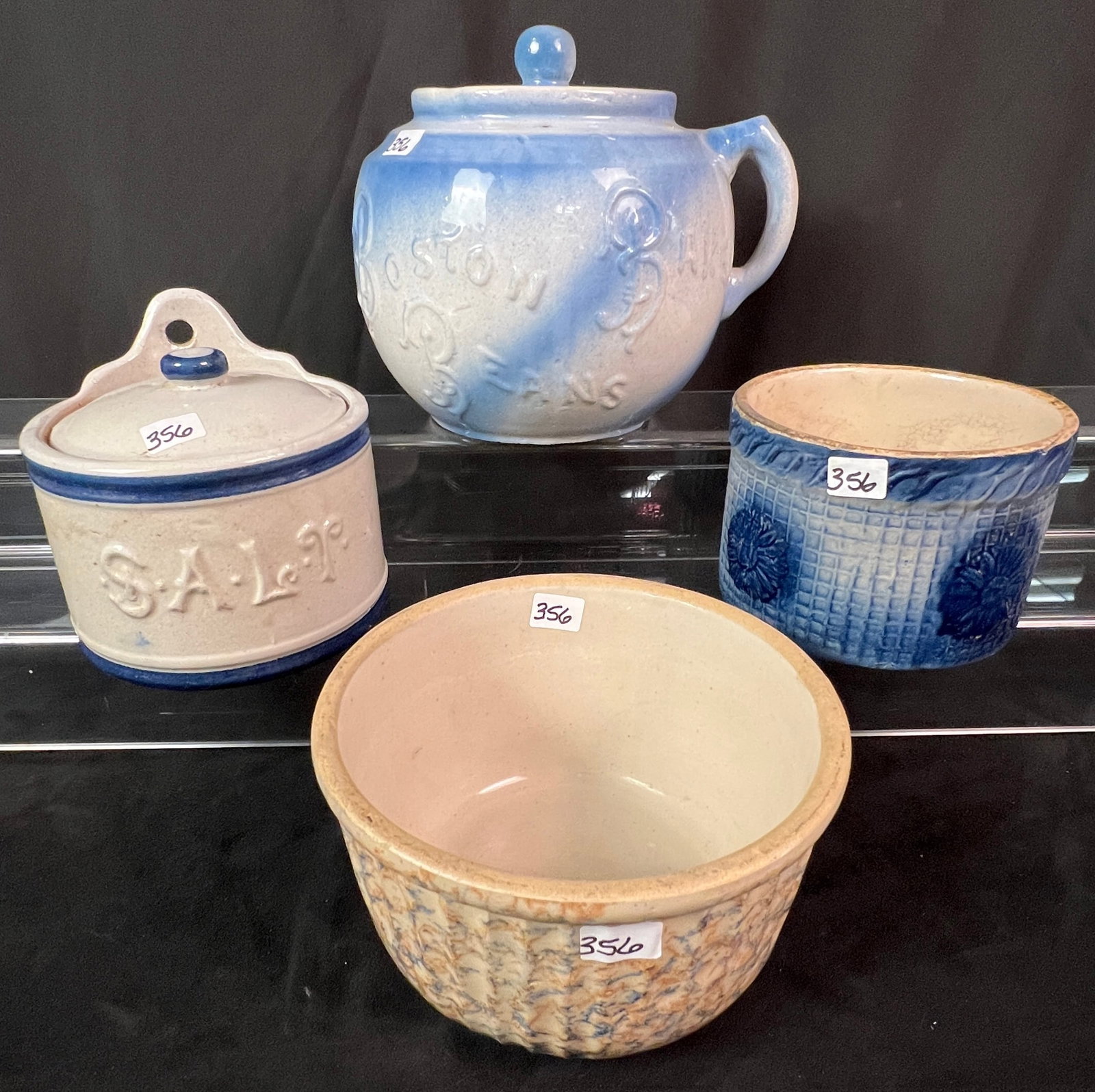 Four Large Pieces of Antique Stoneware To Include Boston Bean Pot: Four pieces of stoneware to include a blue and white Boston baked bean pot with cover that measures 8" x 9". A signed Red Wing spongeware bowl that measures 4.5" x 7". A blue and white floral decorate