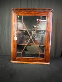 A Late 18th Century Mahogany Hanging Corner Cupboard
