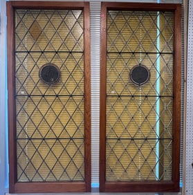 A Large Pair of Diamond Pattern Amber Stained Glass Windows