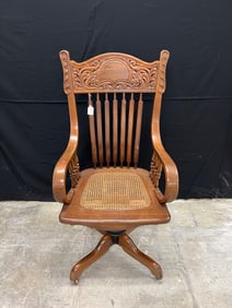 A high grade rolltop armed desk office chair