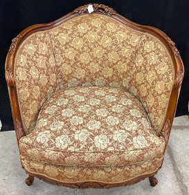 A 1920's Upholstered Floral and Pierced Carved Arm Chair That Matches Previous Lot