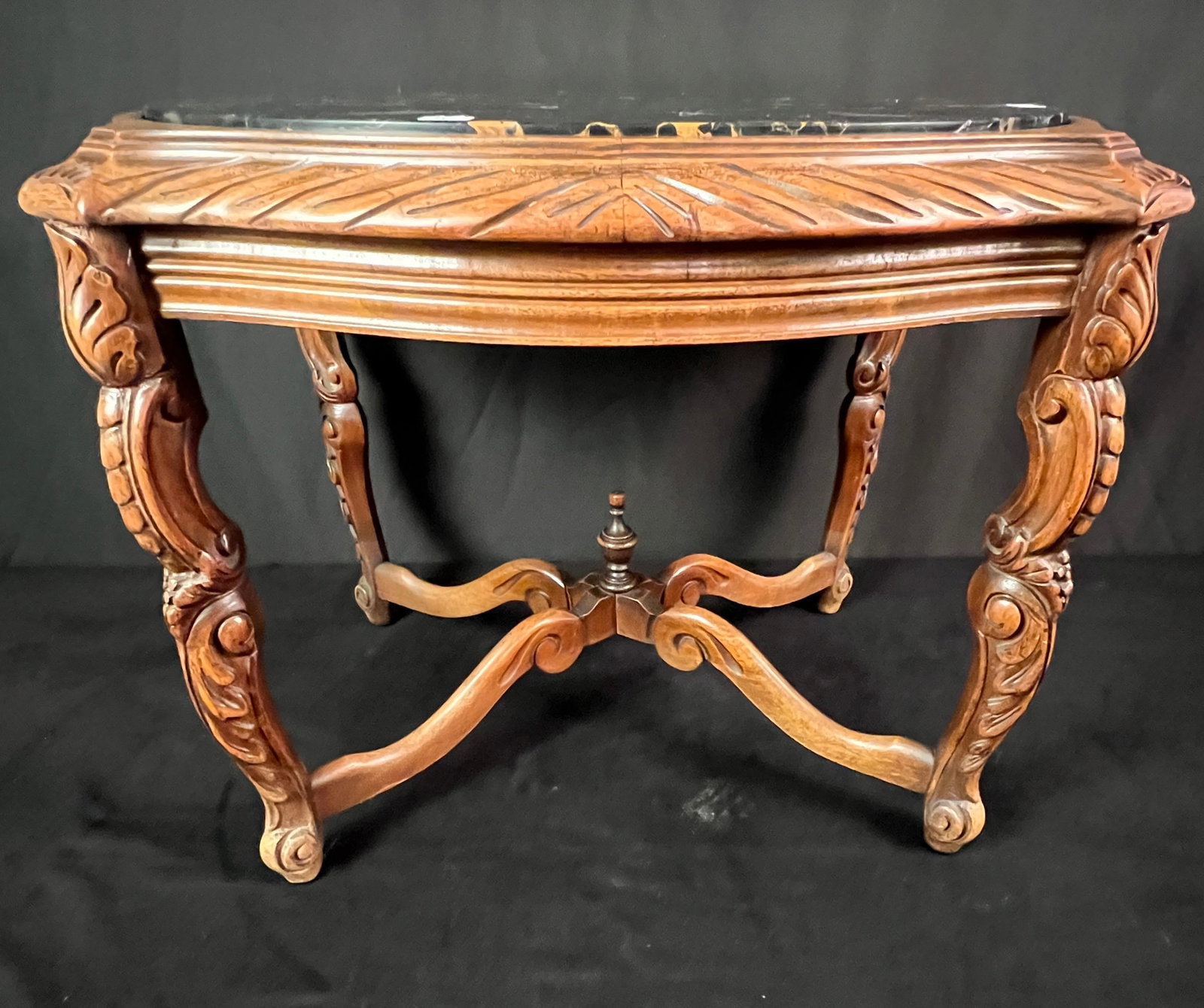 Mahogany Carved Marble Top Side Table c1920's: This antique carved mahogany marble top side table has an oval black variegated marble top insert and is in very good condition.