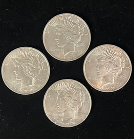 Four Silver Dollars From 1928