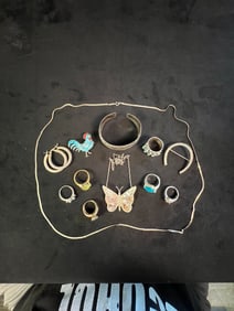 A Sterling Assortment To Include Rings, Bracelet, Earrings, and Necklaces/Chains