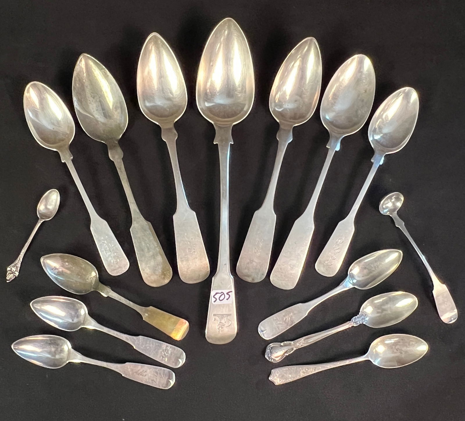 A Group Of Early Sterling Silver Fiddle Head Spoons In Various Sizes: Three Gorham fiddlehead spoons signed sterling. One measures 9" long, the other two measures 7.5" long. They weigh 190g altogether. Two S. Cockrell sterling English fiddle head spoons they measures 9"