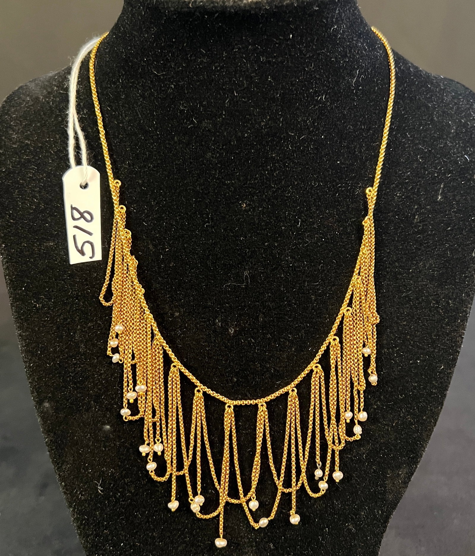 18K Edwardian Festoon and Pearl Necklace: An Edwardian 18k festoon chain and pearl necklace measuring approximately 16" long. Necklace weighs approximately 13 grams.