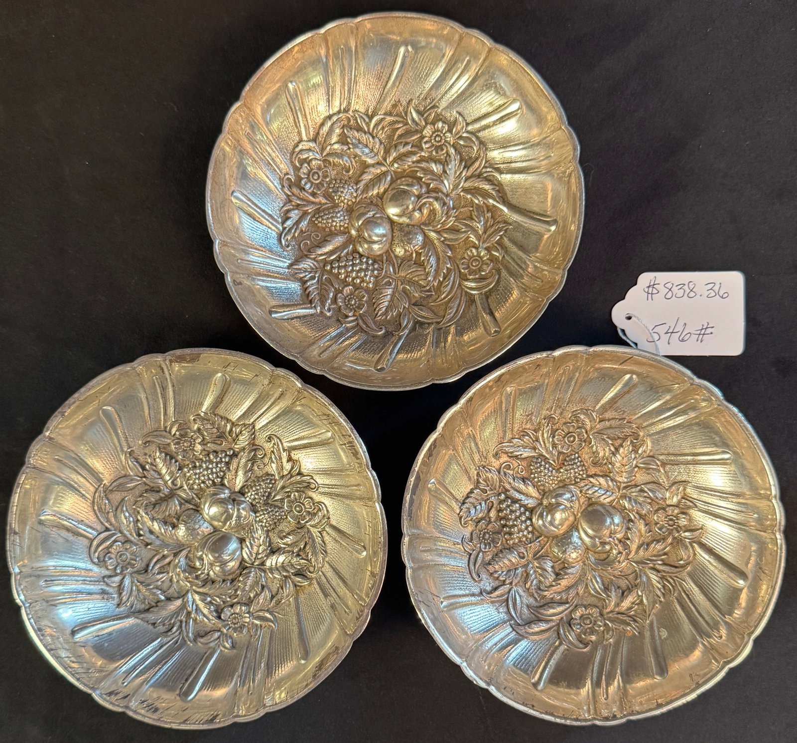 3 Sterling Footed Floral Bowls: A set of 3 sterling floral footed bowls, manufactured by S Kirk & Sons. Each bowl measures 1.5" tall X 6" across, each weighs 161.2 grams, total weight is 483.6 grams (approximately 17 ounces).