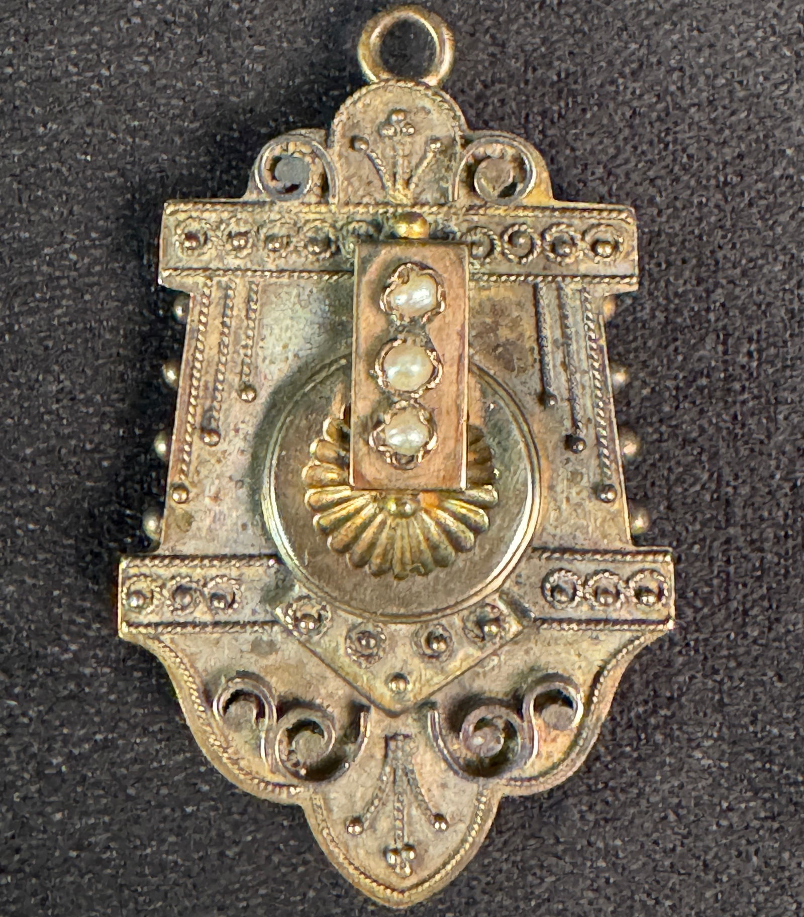 14K Victorian Pendant and Keepsake Locket: A 14K Victorian 1870s pendant with seed pearls and opening back enclosure for keepsakes or mementos. A lovely brooch, it weighs 5.83 grams.