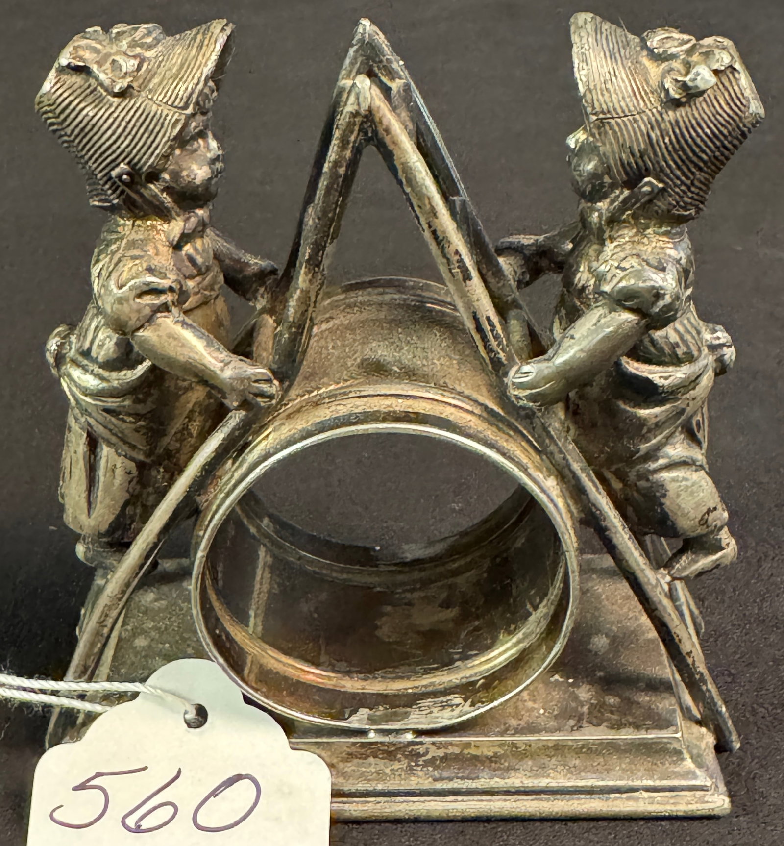 Figural Silverplate Napkin Ring of Little Girls: A silverplate figural napkin ring depicting two young girls on ladder by Simpson Hall Miller and Co. Measures 4" tall X 3.5" across X 2" deep.