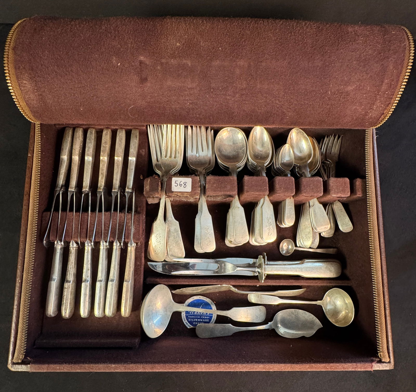 Large Sterling Flatware Set: A large sterling flatware set that has been pieced together over the years. Vast majority is by Gorham and set is in the Fiddlehead pattern. The set includes the following: 10 Gorham soup spoons (382.