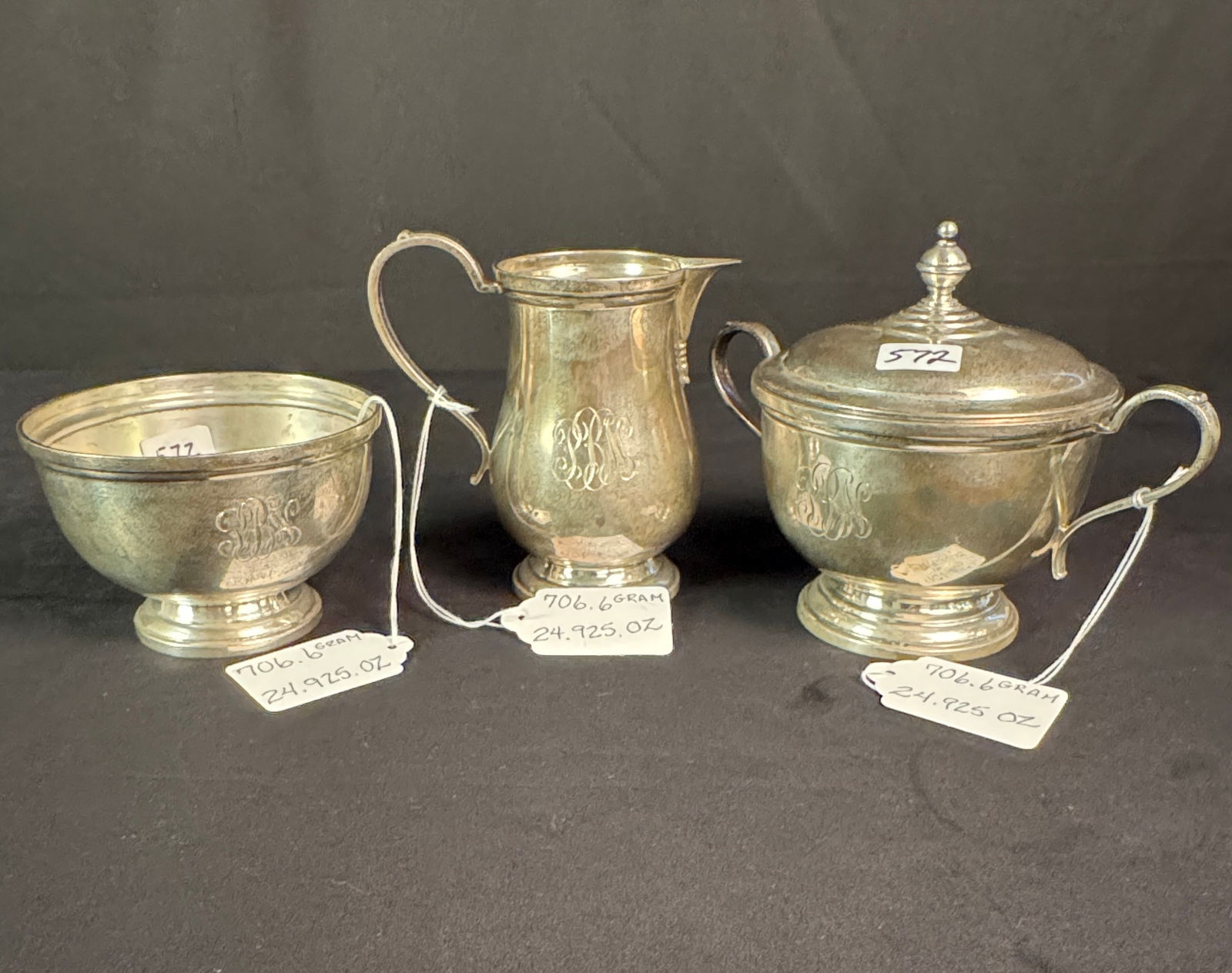 Sterling English Silver Sugar, Creamer and Waste Bowl: An English sterling silver set to include a creamer, covered sugar and waste bowl. Pieces feature monograms and English touchmarks on bottom, pieces are reproductions from 1714-1727. Creamer weighs 6.
