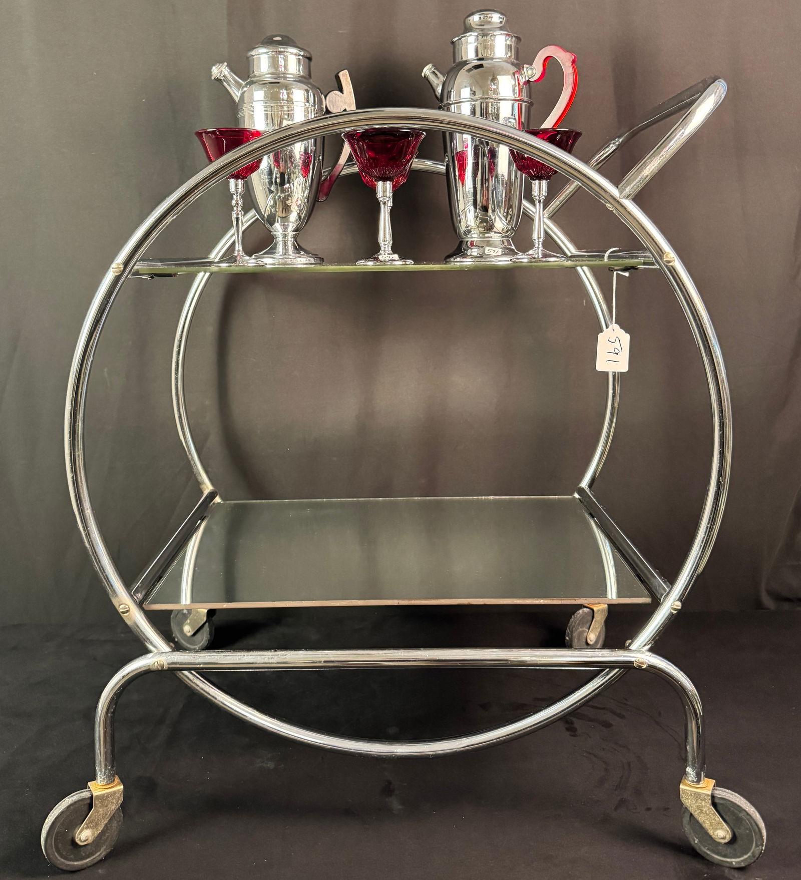 Art Deco Chrome Cocktail Cart, Shakers and Glasses C.1930/40's: An Art Deco 1930's chrome round cocktail trolley with etched glass floral top shelf and mirrored lower shelf in excellent condition. It measures 30" tall X 28" across x 16.5" deep. Also include is a c