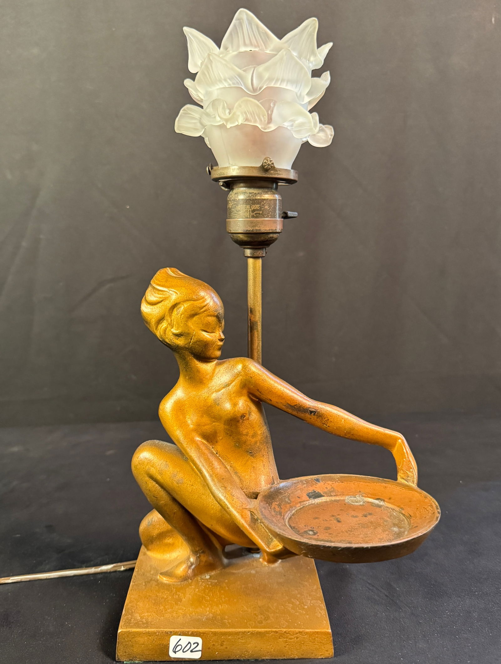 Frankart Art Deco Nude Woman Table Lamp C1930's: This Art Deco Frankart figural table lamp is made of spelter and features a kneeling nude female holding a tray. In very good condition, has original socket and switch. It measures 15" tall X 8" cross