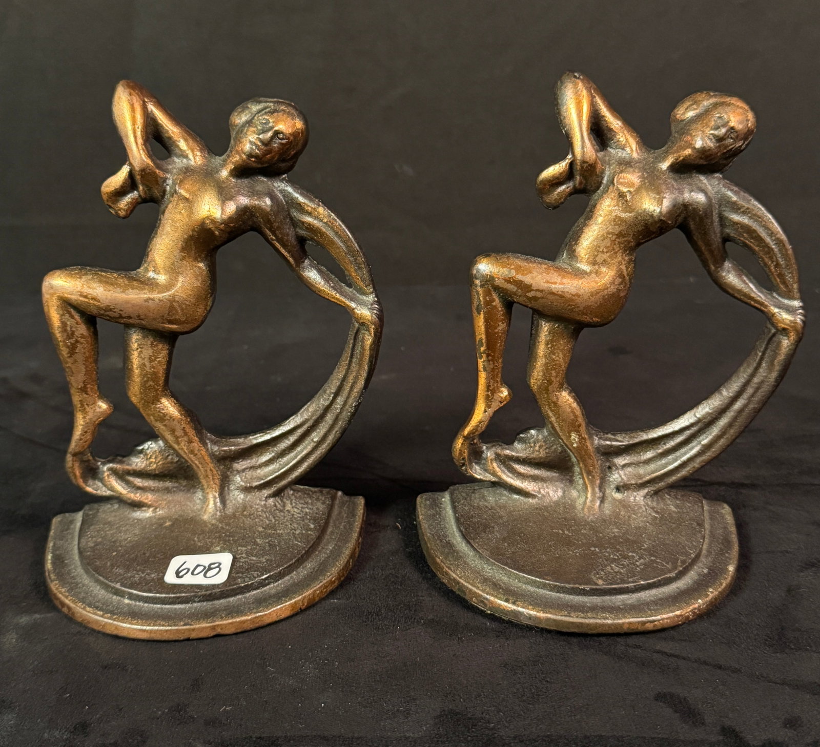 Art Deco Copper Dancing Nude Bookends C1930's: A pair of Art Deco copper dancing nude female bookends in very good condition. They each measure 6.5" tall X 4" across X 3" deep.
