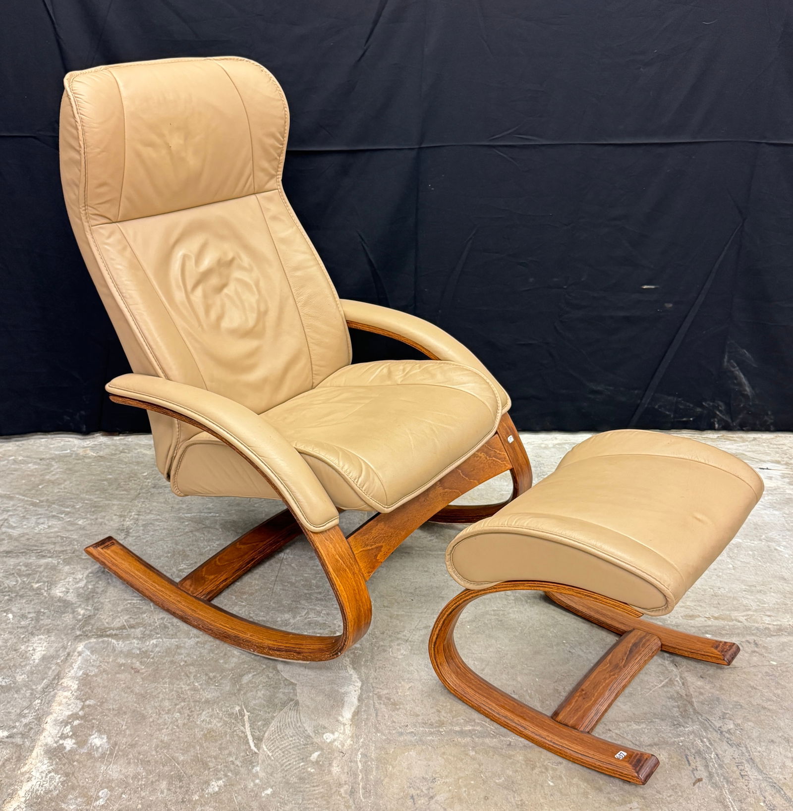 Ekornes of Norway Leather Rocking Chair and Ottoman: A Scandanavian modern leather rocking chair and matching ottoman by J.E. Ekornes, in very good condition.