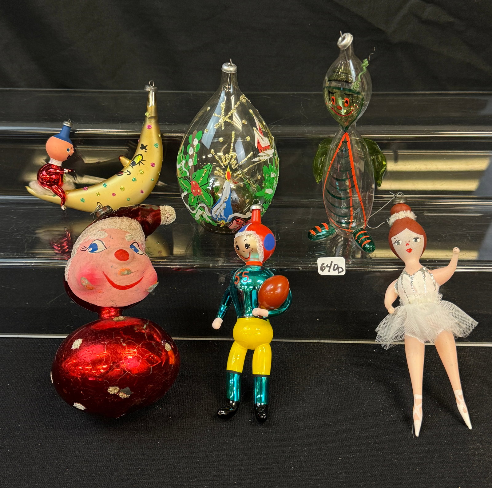Group of DeCarlini Vintage Hand Blown Italian Ornaments, More!: A group of DeCarlini vintage hand blown glass Italian ornaments to include a 6" tall football player, 6" tall ballerina, a 6" Shmoo, a 5" hand painted winter scene, a 6" tall Santa Elf, and a 4.5" man