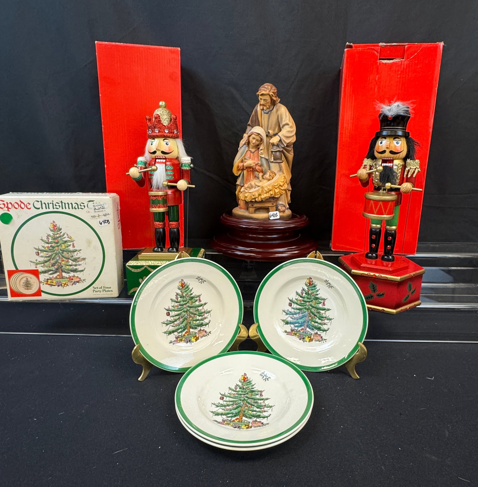 Pema Mable Hand Carved Holy Family, More!: A group of Christmas decorations to include an Italian 11" tall hand carved maple Holy Family statue by Pema on a stand, two 13" tall wood Nutcracker animated music boxes that play the Nutcracker and 