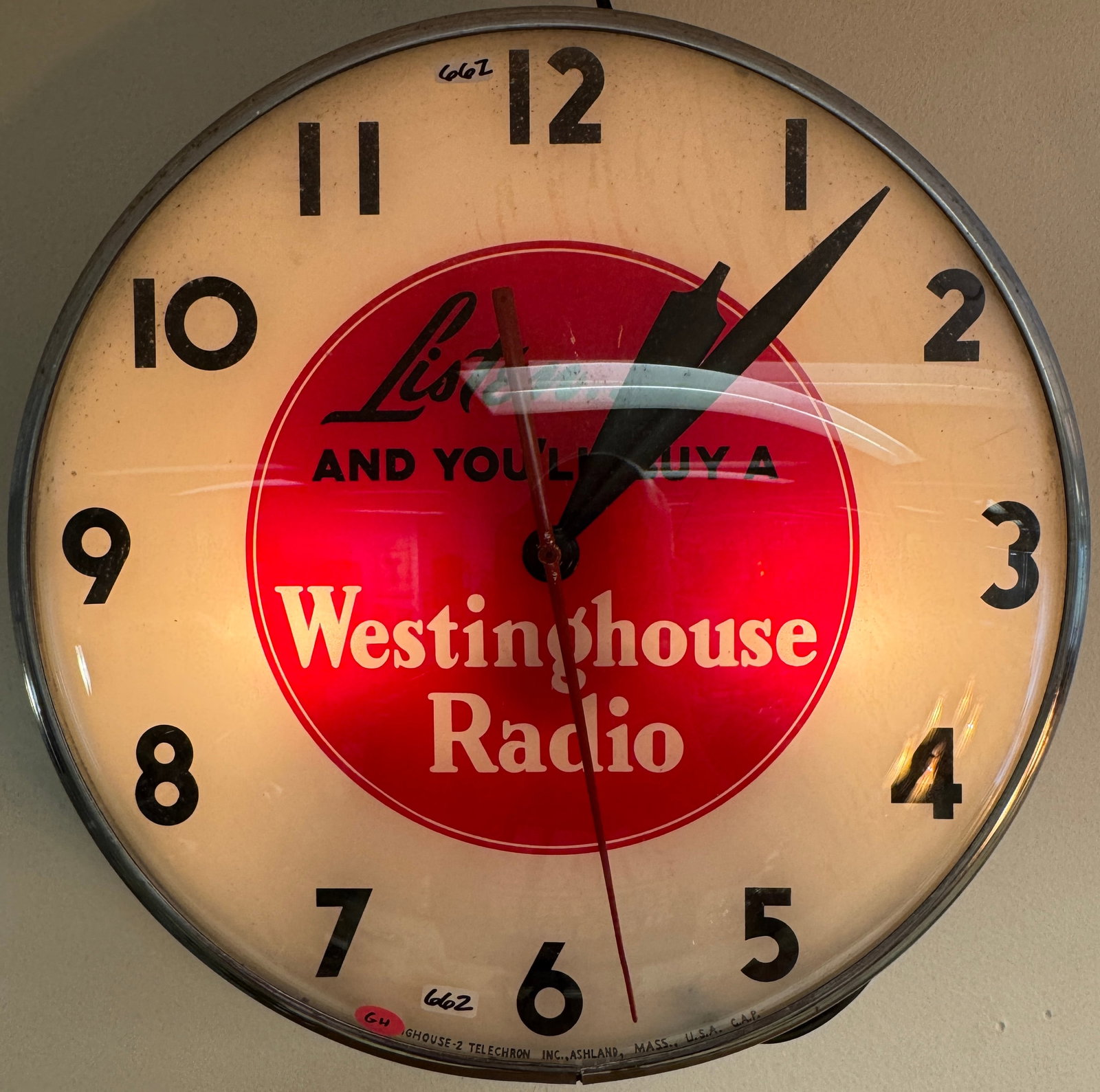Telechron Westinghouse Radio Advertisement Light Up Wall Clock C1950's: A 1950's Telechron light up advertising wall clock for Westinghouse radios that reads "Listen and you'll buy a Westinghouse radio” in excellent working condition. It measures 15" across X 3" dee