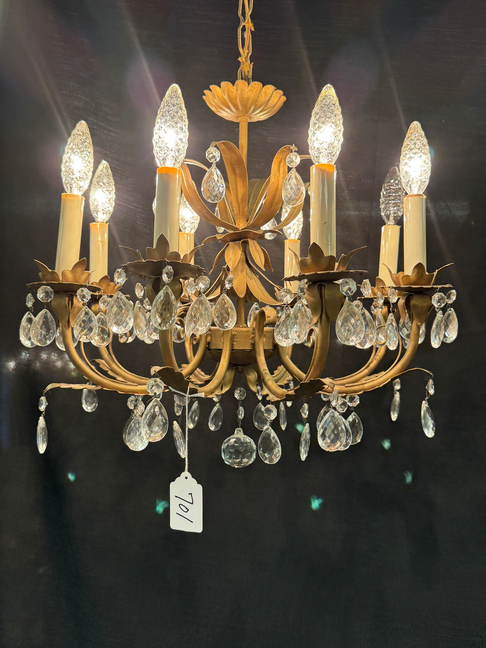 Hollywood Regency 8 Arm Brass Crystal Chandelier c1950's: This brass Hollywood Regency 8 arm chandelier has lead crystal drops and acanthuses arms and detailing. In very good condition it measures 18" tall X 19" across.