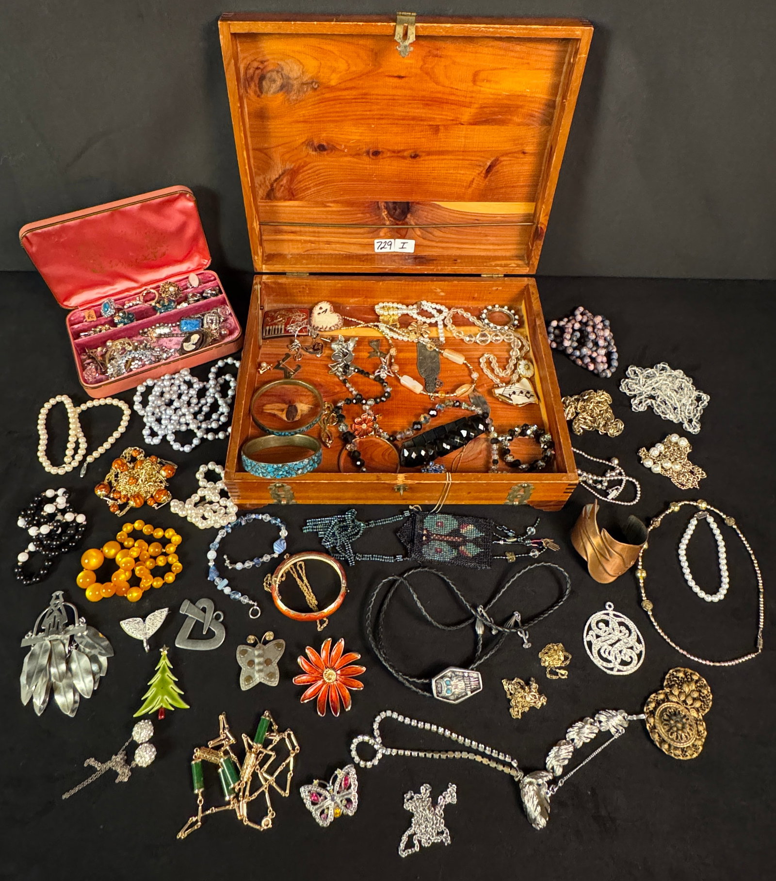 Fancy Cedar Box Filled w/Costume Jewelry: A fancy cedar box filled with over the top, huge amount of costume jewelry.