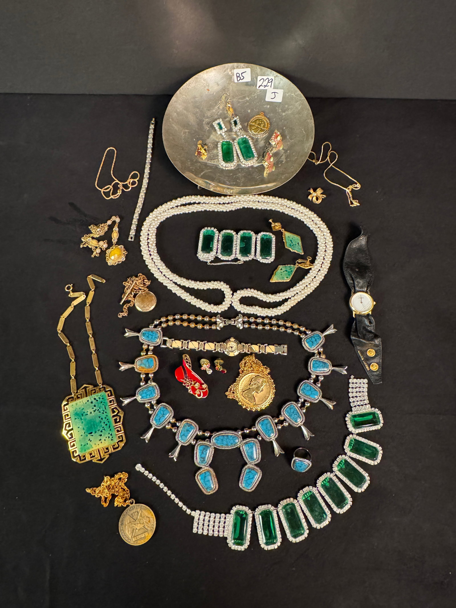 Large Costume Jewelry Lot: Large amount of costume jewelry to include: faux squash blossom necklace, Queen Elizabeth jubilee necklace & earrings; and other quality rhinestone and other jewelry. This is all costume jewelry!