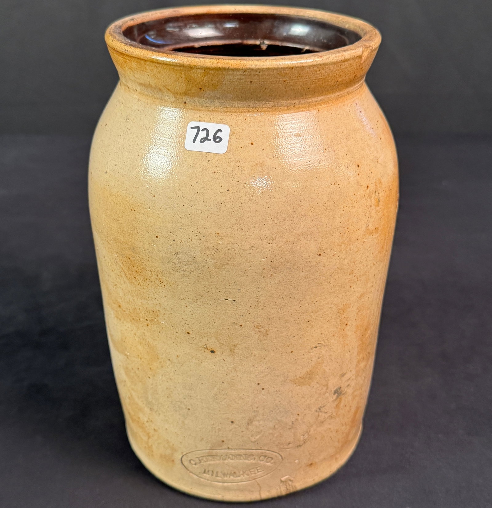 Signed Herman Milwaukee Storage Crock: Storage crock signed Herman Co. Milwaukee, circa 1800's, chip in the lip, measures 9.5"h x 5"w.