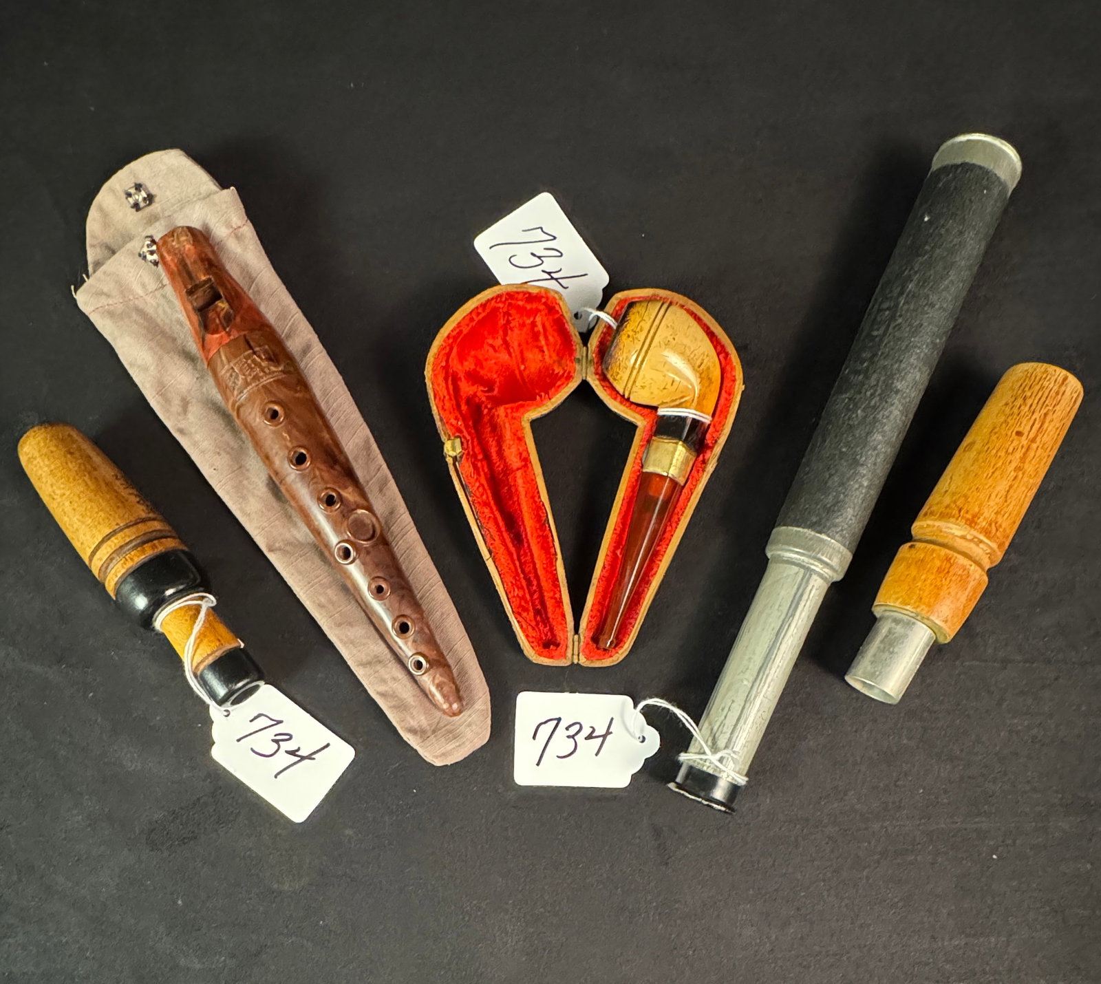 Duck/Goose Calls & More: 1 duck call, 1 goose call signed Cajun made in Lake Charles Louisiana; along with adjustable telescope and a Meerschaum pipe in a case.