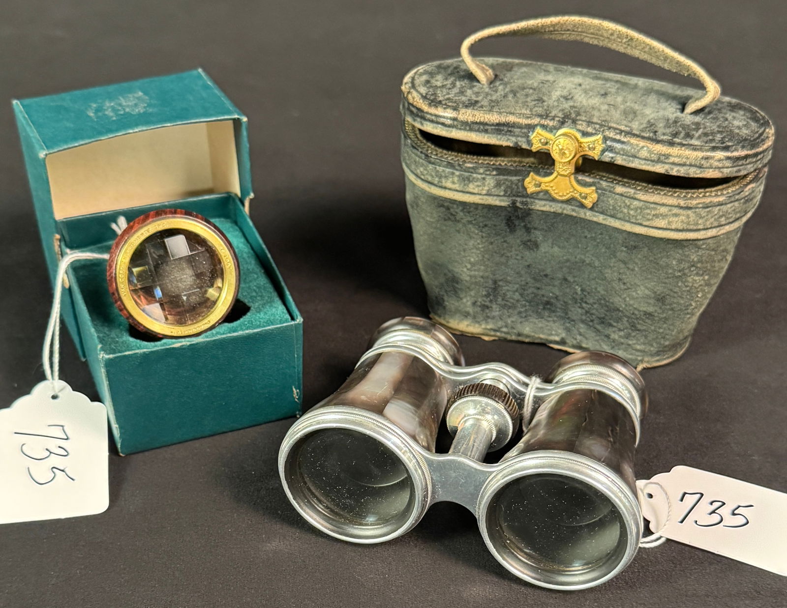 Optical Binoculars & Miniature Spyglass: Mother of pearl optical binoculars; along with a rosewood and beveled miniature kaleidoscope/spyglass, in its original box, signed.